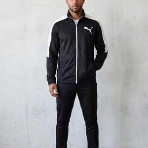 Vintage Puma Black Track Jacket with White Shoulder Stripes.